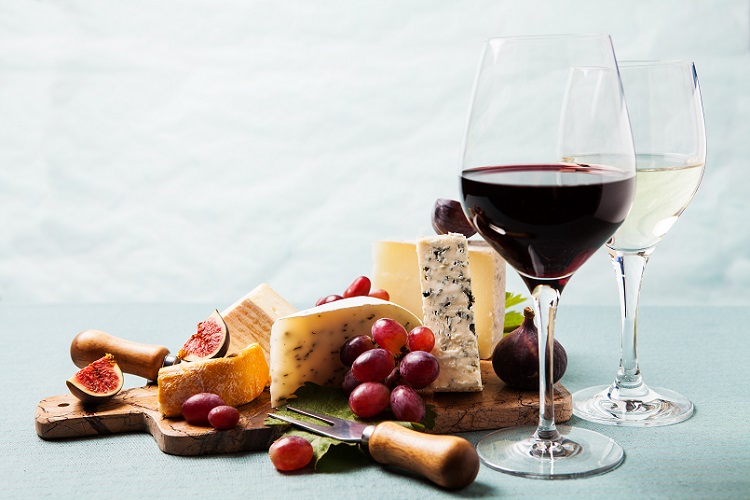 Variety of cheeses on serving board